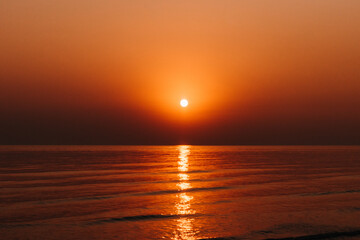 Fototapeta premium Scenic view of beautiful sunset at sea