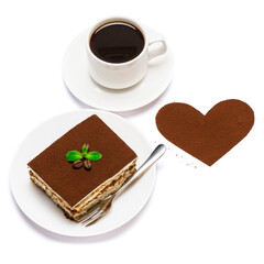 Traditional Italian Tiramisu square dessert portion on ceramic plate, cup of fresh hot espresso coffee and heart shape made of cocoa powder isolated on white