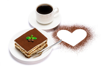 Traditional Italian Tiramisu square dessert portion on ceramic plate, cup of fresh hot espresso coffee and heart shape made of cocoa powder isolated on white