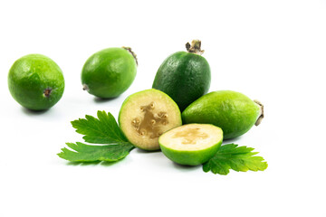 Composition with tropical feijoa or acca sellowiana, pineapple guava fruit ripe and cut on white...