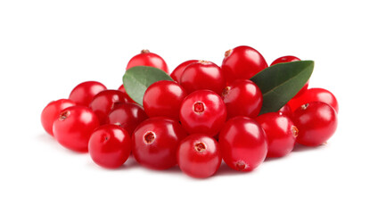 Pile of fresh cranberries with green leaves on white background