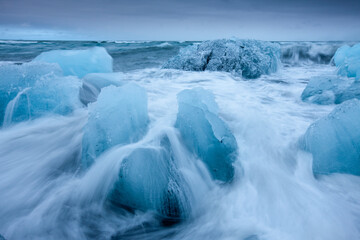 Icebergs in Surf by Jokulsarlon, Iceland