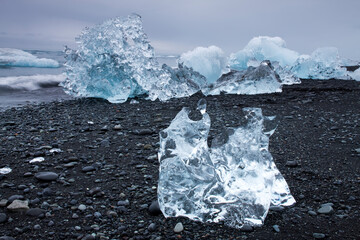 Icebergs in Surf by Jokulsarlon, Iceland