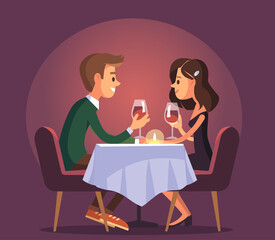 Dating. Valentines day celebration. Sweet happy young couple having romantic dinner with glasses of red wine on date.Drink wine.Christmas evening celebration.Pair couple together at the dinner table.