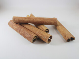 cinnamon sticks on white background
