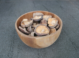 shitake mushrooms in a wood bowl