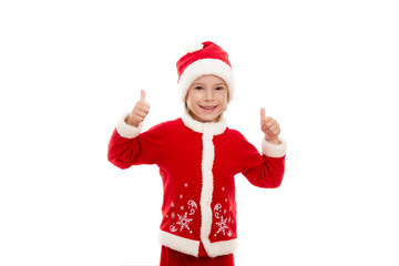 A smiling boy dressed as Santa Claus and in a good mood