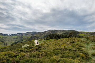 Green scrub-covered hills and valleys in the Tautavel region of southern France