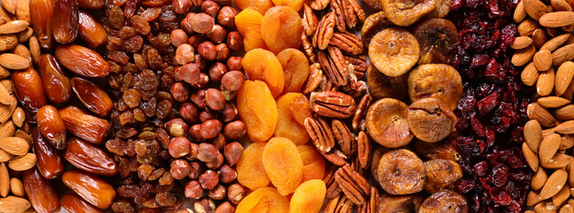 nuts and dried fruits background - obrazy, fototapety, plakaty
