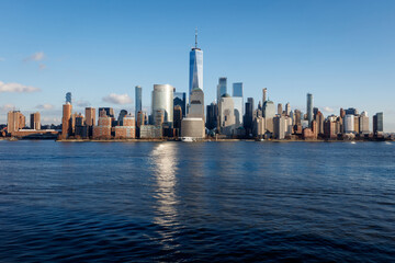 Fototapeta na wymiar New York City Manhattan skyline daytime with One World Trade Center Tower (Freedom Tower)over Hudson River viewed from New Jersey
