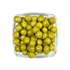 Canned green peas in square glass transparent bowl, macro close-up isolated on white backround, top view