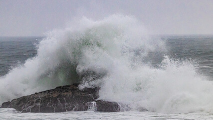 waves crashing on the rocks