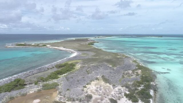 aerial view dolly in carenero island over island Caribbean Sea and white sand beach in Los Roques, Venezuela