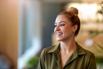 Portrait of an young businesswoman in a modern office 
