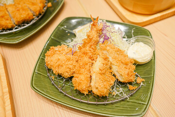 deep fried breaded pork served with sauce,Japanese food, Tonkatsu of pork
