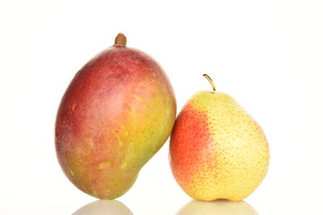 One juicy pear with mango, close-up, on a white background.