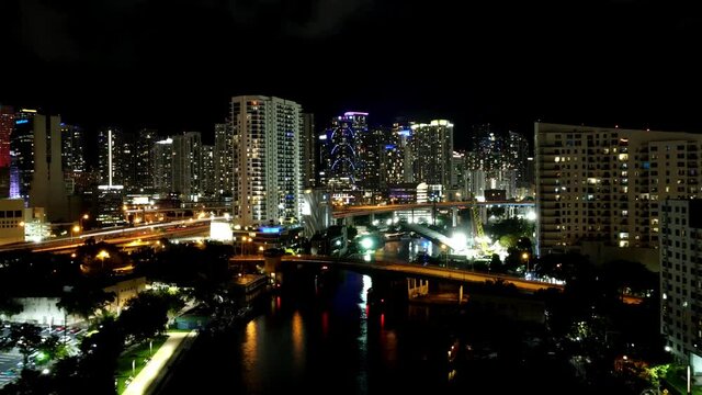 Time lapse aerial in miami downtown at night