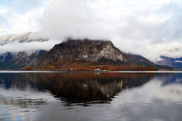 Beautiful view in a foggy day and clouds between the mountains. Hallstatt, Austria, Salzkammergut region