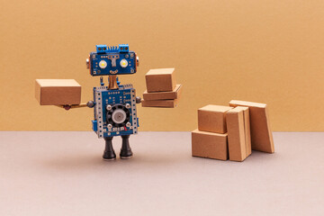 Robot packer storekeeper sorts parcels. Automation service warehousing, groceries and shipments.