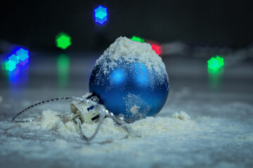 Christmas toys sprinkled with snow .