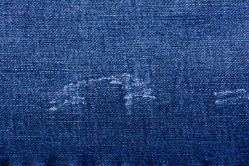 Closeup of denim jeans textile texture background