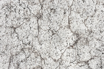 White paint asphalt cracks texture. Scratched lines background. White and black distressed grunge concrete wall pattern for graphic design.