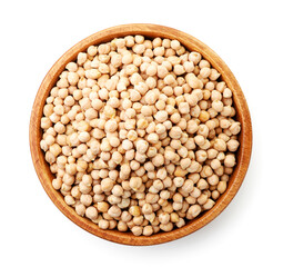 Dry chickpeas in a wooden plate on a white background, isolated. The view from top