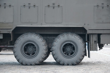 Close up of green military truck. Modern military transportation vehicle technologies