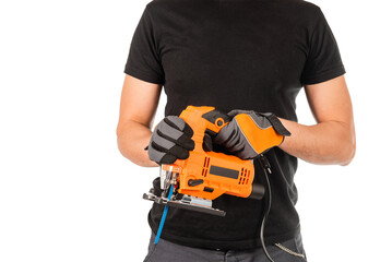 Man with electric jigsaw on white background.