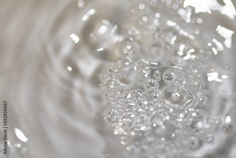 Poster water drop abstract background, fresh an clean background image. blurred wave and drop in trasparent