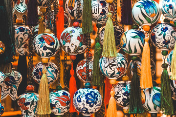 Souvenirs and gifts from Turkey. Ceramics, lamps and decor on a market counter in Istanbul.