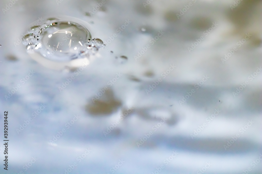 Poster water drop abstract background, fresh an clean background image. blurred wave and drop in trasparent