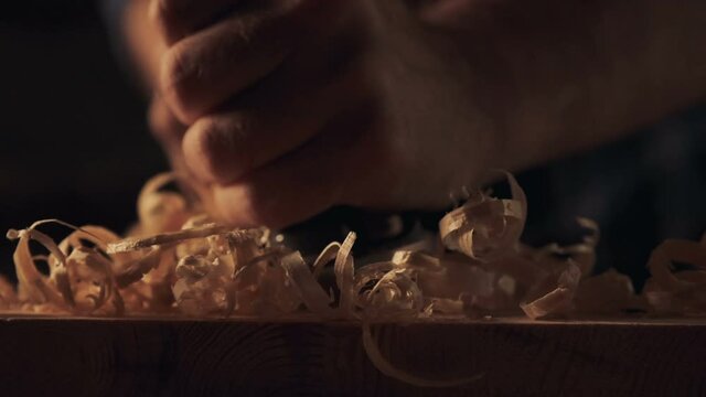 Close up of wooden shavings and jointer