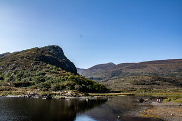 Shehy Mountains on the border between County Cork and County Kerry. When the icecaps retreated, they left behind hundreds of lakes in the valley