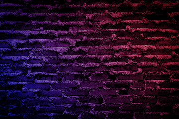 Neon light on brick walls that are not plastered background and texture. Lighting effect red and blue neon background vertical of empty brick basement wall.