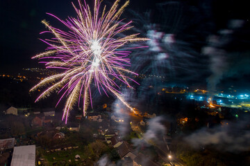 Aerial view of fireworks over south wales houses on bonfire night, United Kingdom