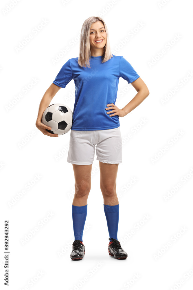 Poster full length portrait of a woman football player smiling and holding a ball