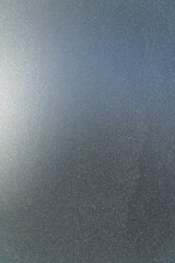 Frozen window glass covered with frost