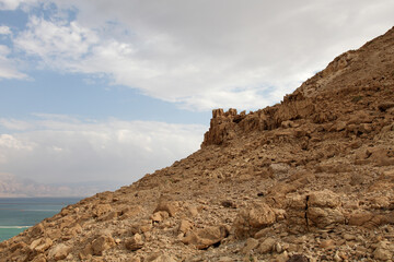 Fototapeta premium Part of the mountain against the background of the sky and the sea.