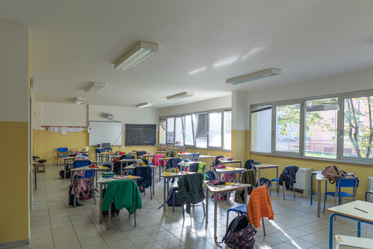 View of a classroom with desks and chairs