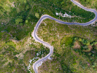 Snake Curves. Aerial view of a road through the mountains. 