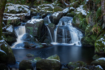 Waterfall with Moss Covered Rocks and Snow, Glencree, Ireland