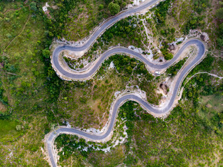 Snake Curves. Aerial view of a road through the mountains. 