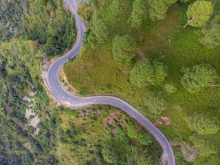 Aerial view of a road through the mountains. Taken through a drone in the himalayas.