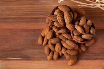 almond, almonds, amendoas, amêndoas, background, closeup, brown, straw background, straw, dry, food, fruit, gourmet, group, health, healthy, heap, ingredient, kernel, natural, nature, nut, nutrition, 