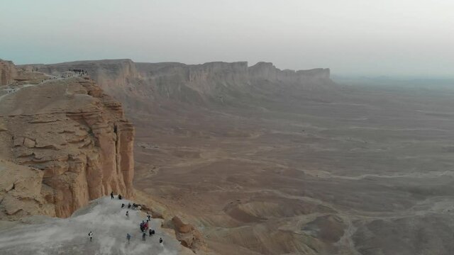Tourists visit The Edge of the World near Riyadh, Saudi Arabia