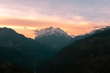 The Himalayan mountain peak of Mount Hansling at sunset hour in the village of Munsyari in Uttarakhand.