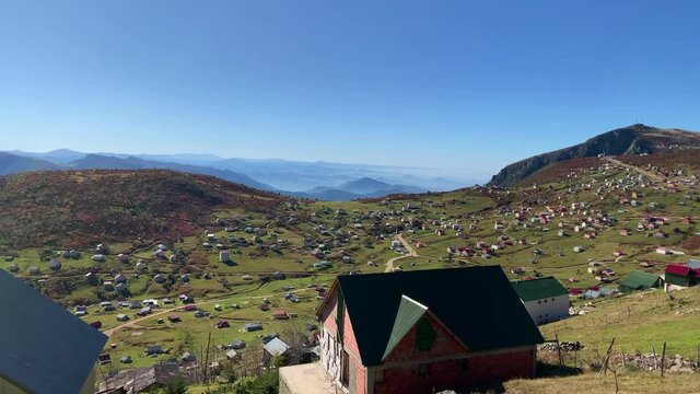 Footage of mountain village (high plateau) called "Sis Dagi" of Trabzon city of Black sea region in Turkey. Beautiful nature scene in sunny day. Camera pans.