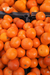 Mandarin fruits. Clementine on the market. Harvest of tangerines.