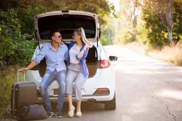 Best friends enjoying traveling in the car, having lots of fun on a road trip